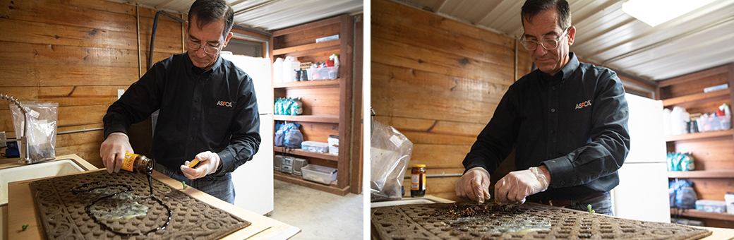 a man pouring molasses on a mat and placing treats on it