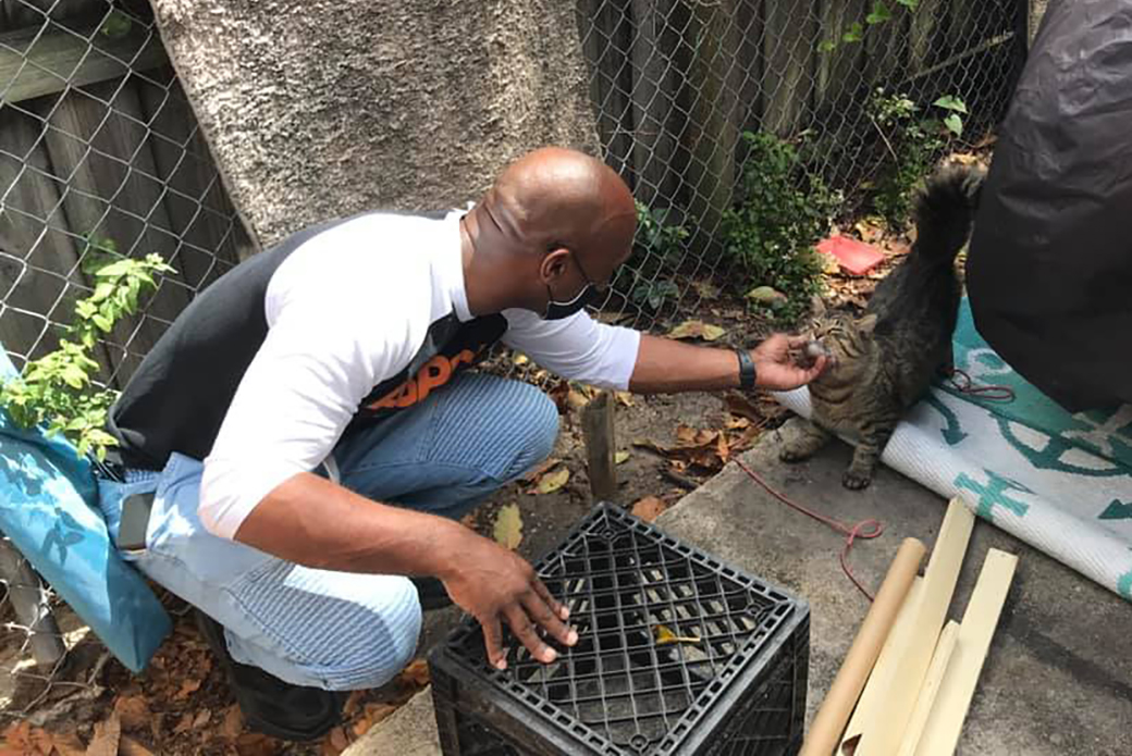 Marlon with one of Tony's cats